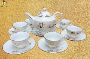 Ấm chén Đèn Thần hoa văn vàng kim